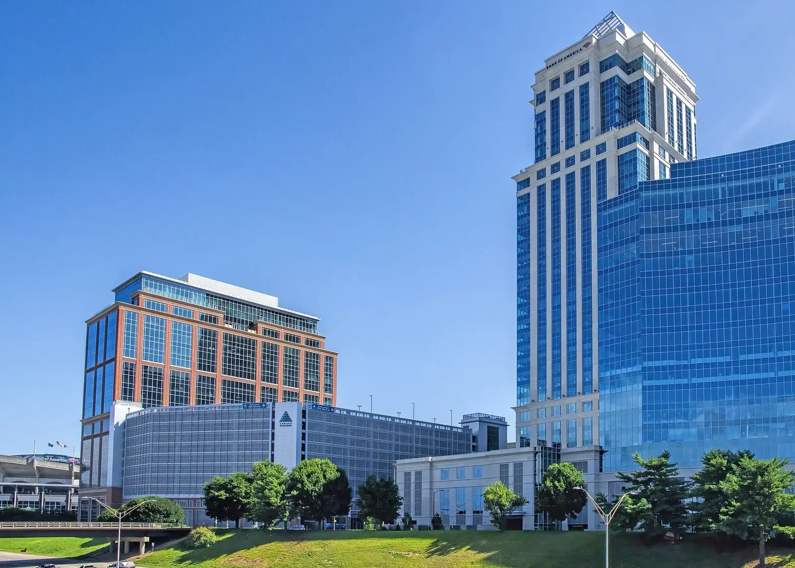Uptown Charlotte office towers in morning light under a clear blue sky