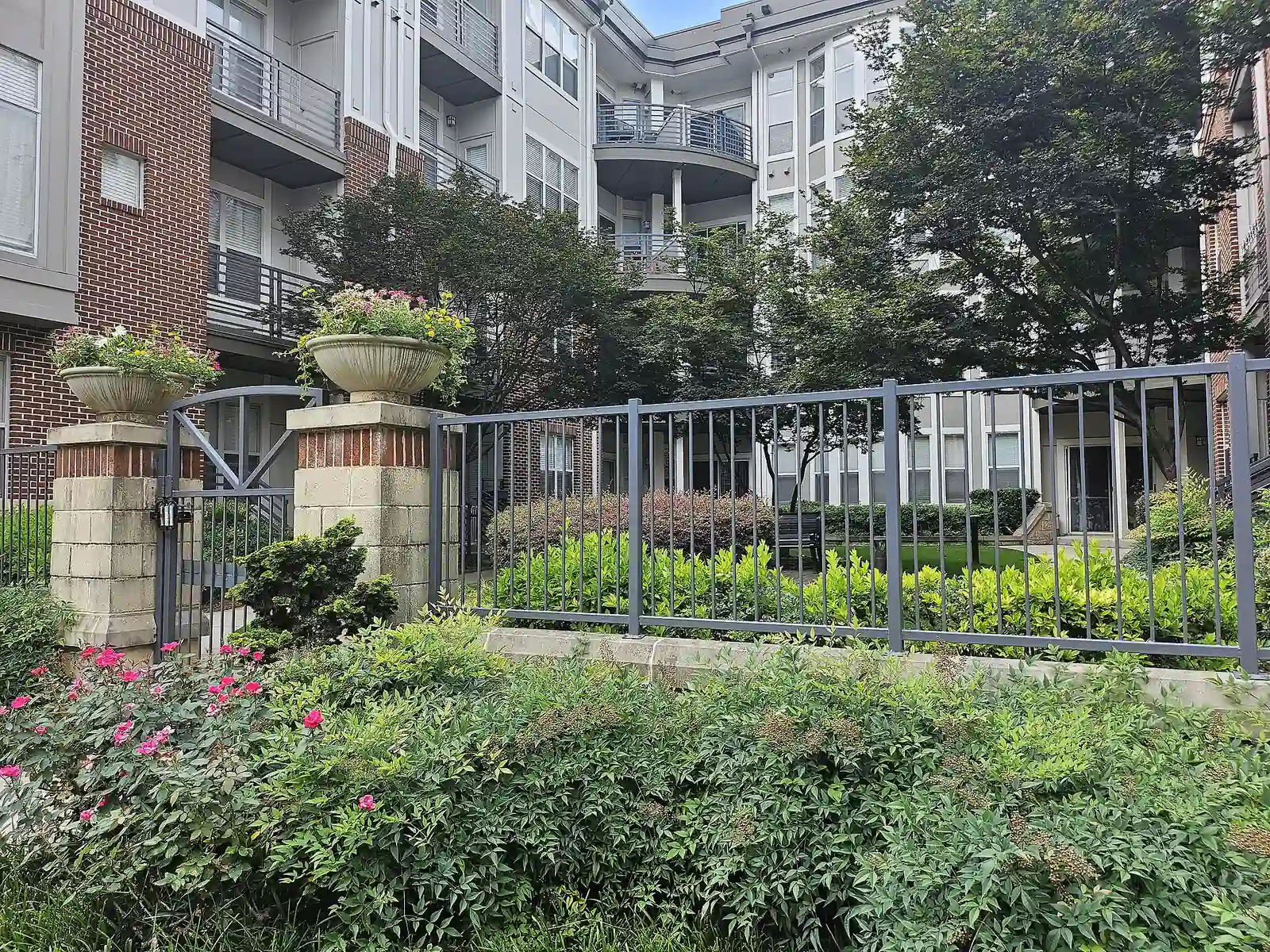 Gated courtyard with plantings on Scott Avenue in Dilworth, Charlotte