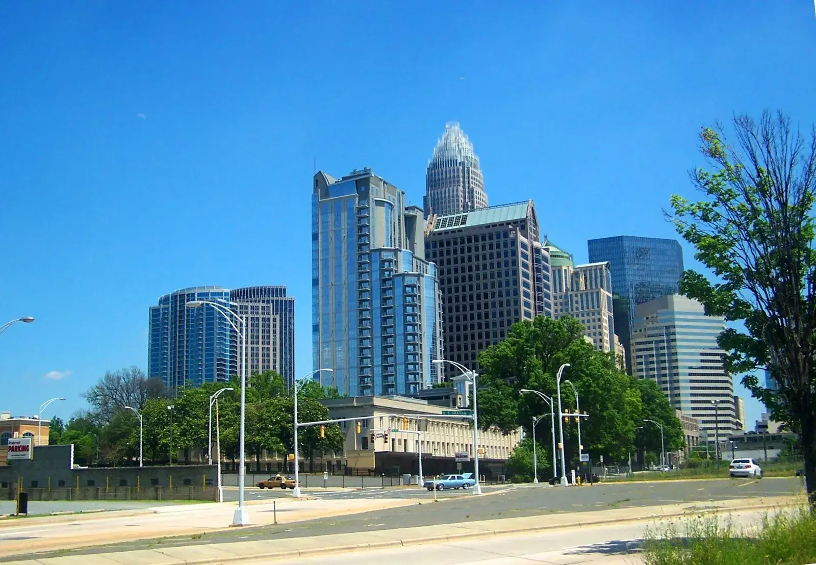 Glass towers and a street intersection in Uptown Charlotte on a sunny day