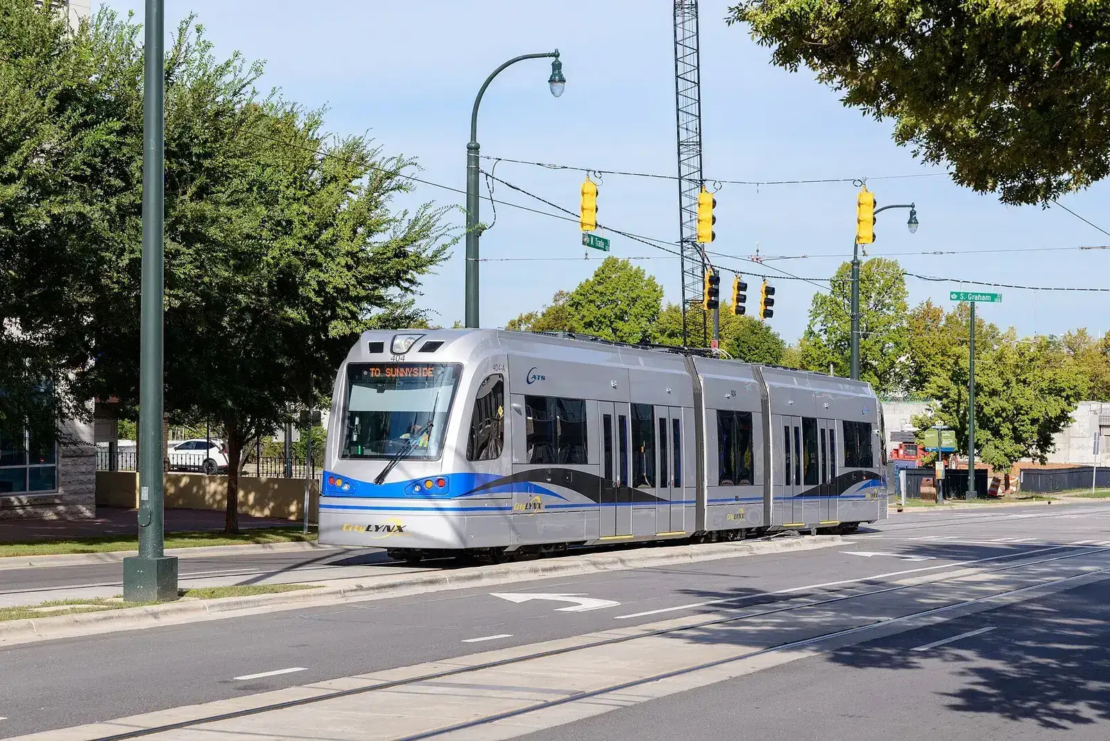 Modern CityLynx streetcar passing Graham Street in Charlotte