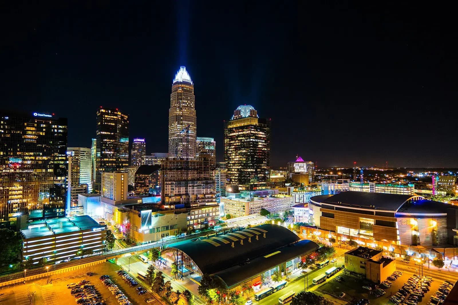 Charlotte skyline at night with illuminated towers and city lights