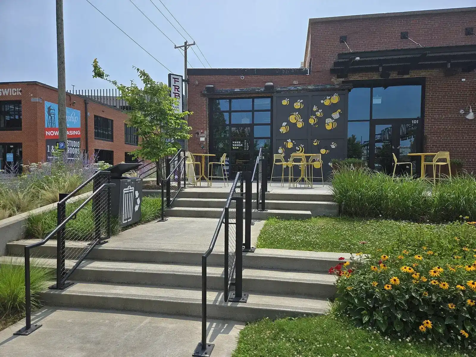 Steps, plantings and patio at the 301 Camp building at Camp North End in Charlotte